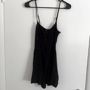 Black romper from H&M, size 6